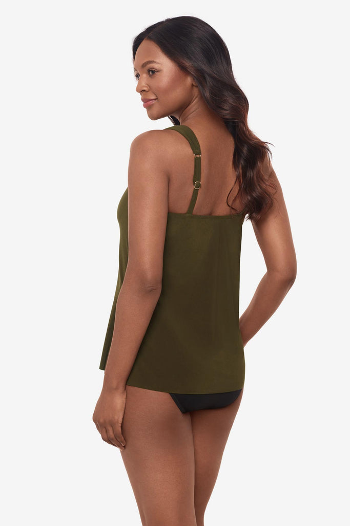 Woman facing left to show off the detail of the nori green tankini top