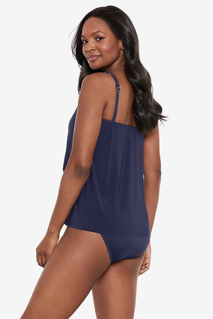 Woman acing left to show detail of the tankini top