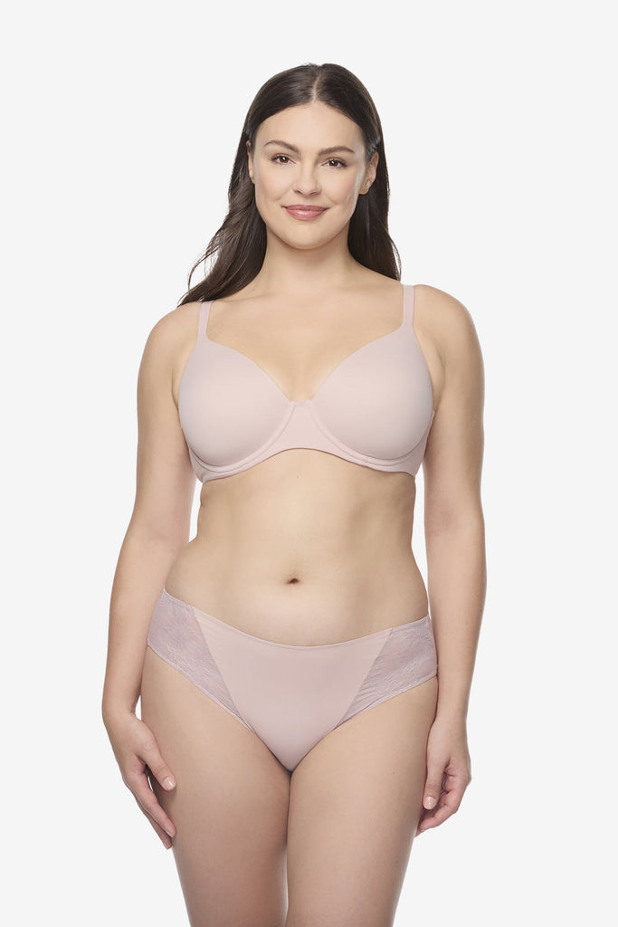 Woman wearing light pink hipster shapewear
