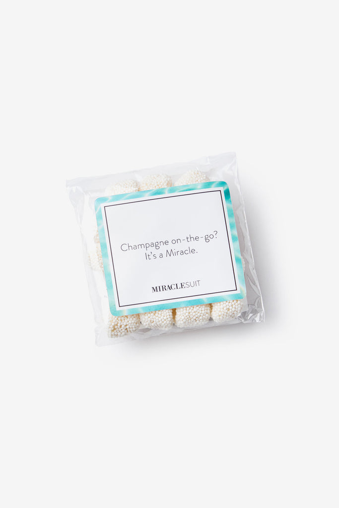 One package of gummy candies that read "Champagne on the go? It's a miracle." on the label